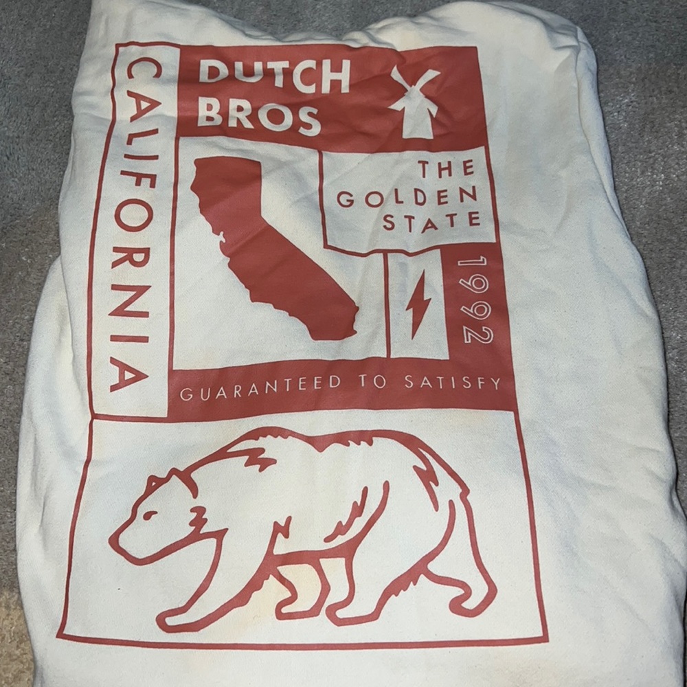 Cream colored California Dutch bros hoodie.